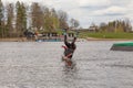 Fagersta, Sweden - Maj 07, 2020: Girl teenager wakeboarder fells into the water after an unsuccessful jump