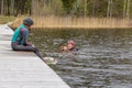 Fagersta, Sweden - Maj 07, 2020: Girl teenager wakeboarding discuss a failed jump