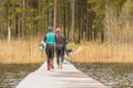 Fagersta, Sweden - Maj 07, 2020: Girl teenager wakeboarding go on the pier