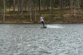 Fagersta, Sweden - Maj 01, 2020: Teenager wakeboarding on a lake