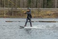 Fagersta, Sweden - Maj 01, 2020: Teenager wakeboarding on a lake
