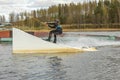 Fagersta, Sweden - Maj 01, 2020: Teenager wakeboarding on a lake