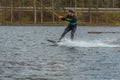 Fagersta, Sweden - Maj 01, 2020: Teenager wakeboarding on a lake during a physical education lesson