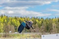 Wakeboarder flies in the air on wakeboard. Wakeboarding is Extreme Sports Royalty Free Stock Photo