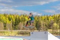 Wakeboarder flies in the air on wakeboard. Wakeboarding is Extreme Sports Royalty Free Stock Photo