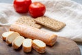 Fagotin cheese with orange coloured rind made from cow milk in caves of Maredsous abbey, Belgium