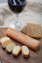 Fagotin cheese with orange coloured rind made from cow milk in caves of Maredsous abbey, Belgium