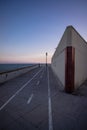 Spain Andalusia Bicycle path on seafront ocean sunset