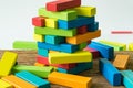 Fail and collapse colorful wooden block tower in as Risk or stab Royalty Free Stock Photo