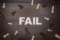 Fail concept on wooden background Royalty Free Stock Photo