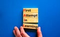 FAIL first attempt in learning symbol. Wooden blocks with words FAIL first attempt in learning. Beautiful blue table, blue