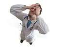 Failure and malpractice concept. Disappointed and stressed doctor. Royalty Free Stock Photo