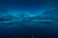 Faint aurora borealis at Jokusarlon Glacial Lagoon, Southeast Iceland