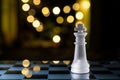 Faint King On Blue Chessboard With Bokeh Royalty Free Stock Photo