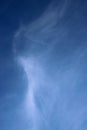 Faint wispy white clouds abstract pattern blue sky Royalty Free Stock Photo