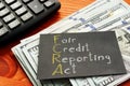 Fair Credit Reporting Act FCRA is shown on the business photo using the text