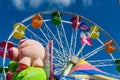 Fair games and rides on a blue sky day Royalty Free Stock Photo
