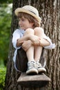 Fair-haired boy in sneakers Royalty Free Stock Photo