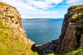 Fair Head cliff, Atlantic Ocean and Rathlin Island in Northern Ireland, UK