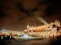 Fair in KRAKOW. Main Market Square and Sukiennice in the evening.