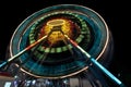 A fair ride shot with a long exposure at night - Ferris wheel in the evening, creating light streaks Royalty Free Stock Photo