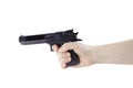 Fair-skinned woman`s hand holding black gun, isolated on white background Royalty Free Stock Photo