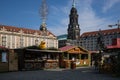 Fair stalls at Altmarkt. Kreuzkirche bellfry on background.