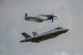 FAIRFORD, UK - JULY 10: F-35A and a P-51D Aircraft participates in the Royal International Air Tattoo Air show event July 10 Royalty Free Stock Photo