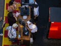 Flat lay of fairgoers buying and selecting food from the vendors at the LA County Fair in Pomona