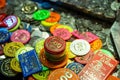 Fairground chips many colors on a gambling pushing slot machine Blur background