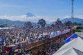 fairground of giant kites with different shapes and people appreciating