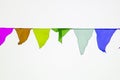 Fairground triangle flag hanging on a rope for a fun party Fiesta event, carnival festival event, Park or street Festa decoration Royalty Free Stock Photo