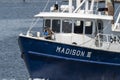 Fisherman coiling line aboard clammer Madison III Royalty Free Stock Photo