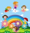 Fairies flying over the rainbow Royalty Free Stock Photo