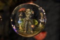 Fairies inside crystal sphere with mushrooms and orbs