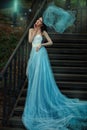 Fairy blue long dress of a fairy tale. Royalty Free Stock Photo