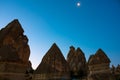 Fairy Chimneys. Peri bacalari or fairy chimneys at sunrise with moon on the sky