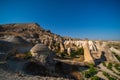 Fairy chimneys rock formations Travel and vacation, tour Summer sunny day. Goreme, Cappadocia, Turkey Royalty Free Stock Photo