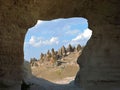 Fairy Chimneys through Stone Window