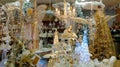 Fairy, christmas tree and decorations at the interior of big store