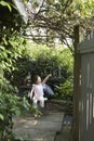 Fairy Girl Holding Out Magicwand At Garden