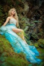 Fairy girl on the rock Royalty Free Stock Photo