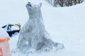 Fairy ice figure of gray wolf in the winter park