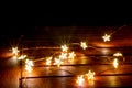 Fairy lights for christimas as illuminated decoration for christmas tree or as festive lights on the table create a romantic mood