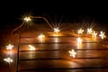Fairy lights for christimas as illuminated decoration for christmas tree or as festive lights on the table create a romantic mood