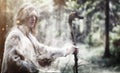 Fairy magician. A sorcerer with a glass sphere, a magical spell Royalty Free Stock Photo