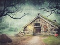 Fairy old stone house in fantasy forest with fog Royalty Free Stock Photo