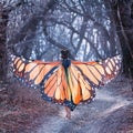 Fairy tale about butterfly, mysterious story of girl with red hair and big light orange wings, lady walks barefoot along