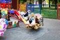 Fairy-tale figures on children\'s carousel in the city park in the morning. Nobody here. Carousels are waiting for children. Royalty Free Stock Photo