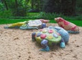 Fairy tale sculptures crocodile turtle and pig in the park of the Castle Schloss Neersen in Germany